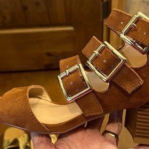 Rust color suede shoes that have a block heel and are like new